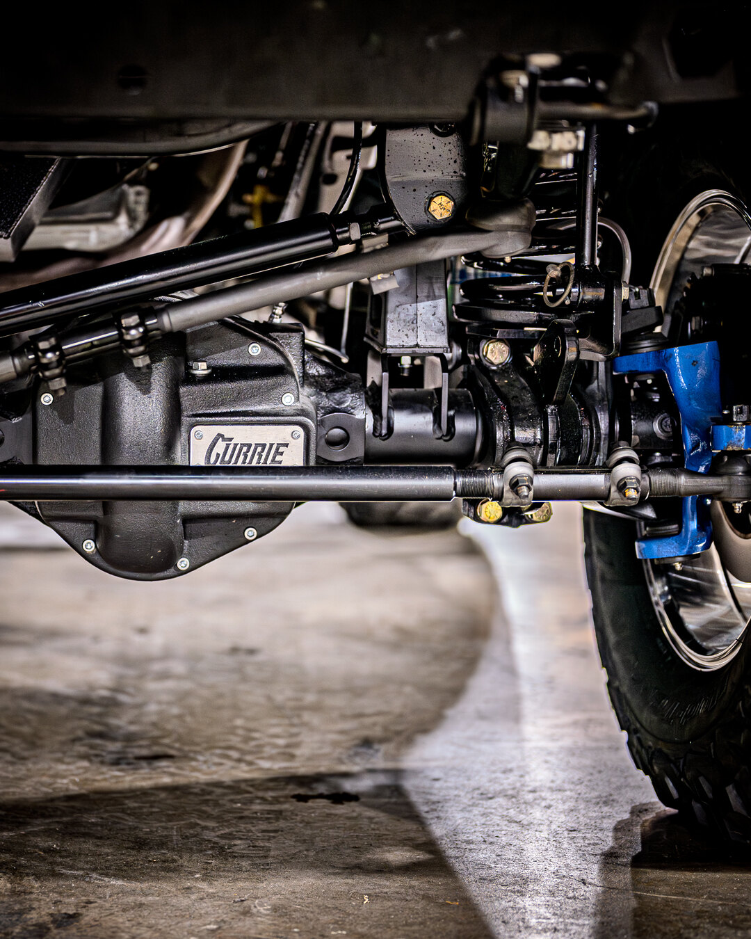 Front axle and suspension detail photographed at ASC 4x4